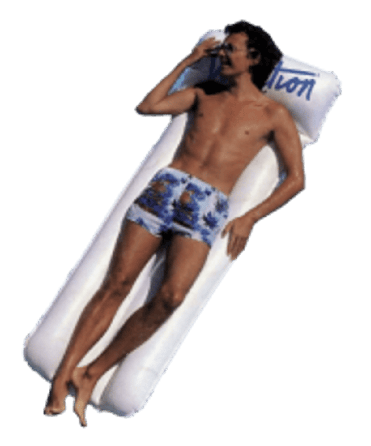 A person relaxing on an Éclatan raft
